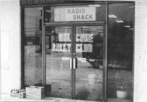 Picture 2 - THE SUPPORT given the Michigan B.U.G. by Ron Pollock of Tri-County Electronics in Fenton, Michigan is evidenced here. He opens the entire mall corridor and lines both walls with multi-level counters, supplies dozen of color TVs, power cords and keeps a large stock of Arcades and accessories handy for everybody.